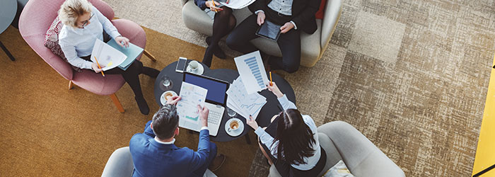 Group of business people in office cafeteria